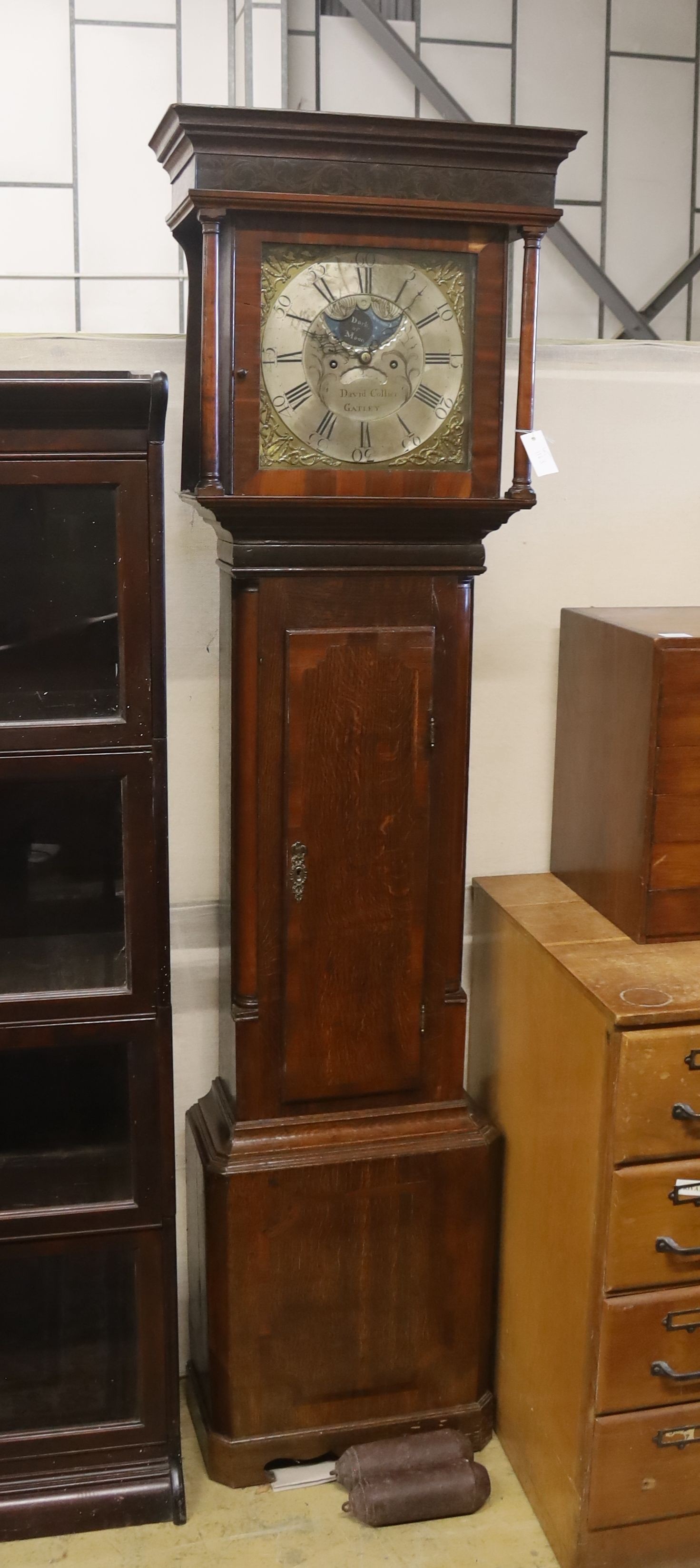 A George III oak and mahogany 8 day long case clock, with moonphase, marked “David Collier Gatley”. H-206cm.